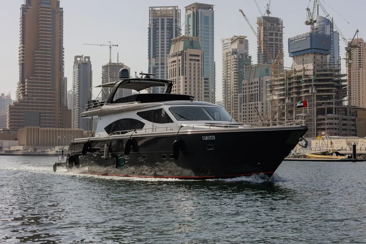 Private yacht Dubai cruising past the Dubai Marina towers